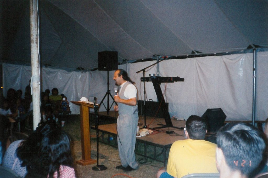 JJ Preaching in Tent